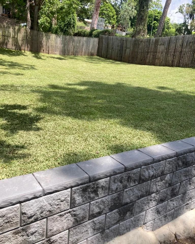 Block retaining wall, backyard level and turf