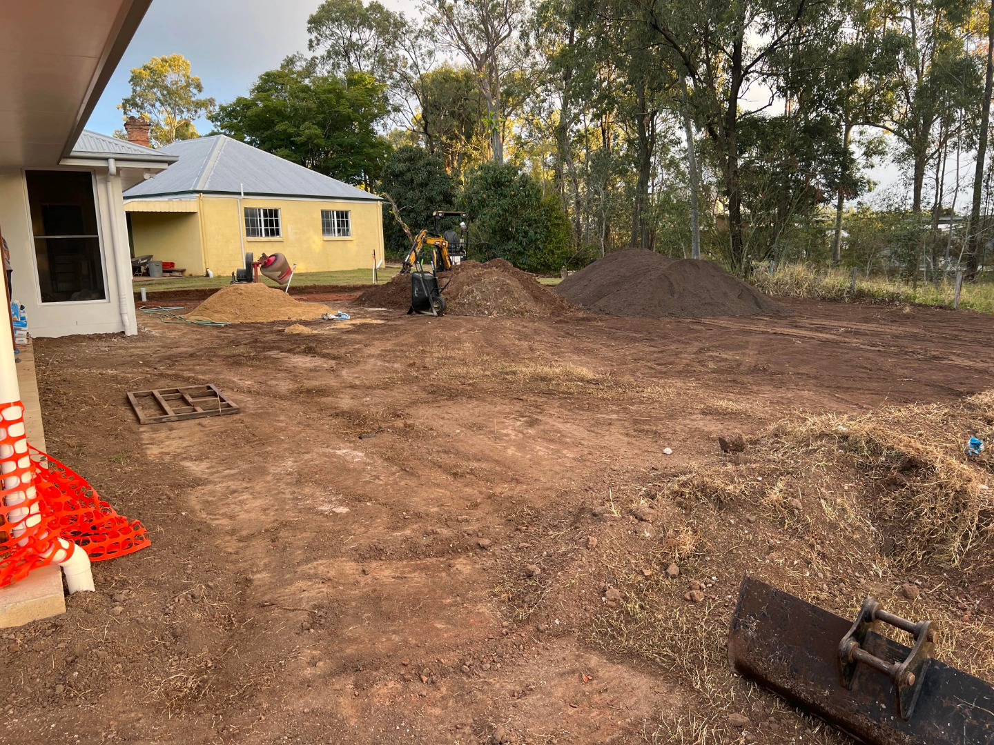 With the vision in mind, the meticulous work of excavation begins. This crucial step prepares the land for the retaining wall, ensuring a stable and secure foundation