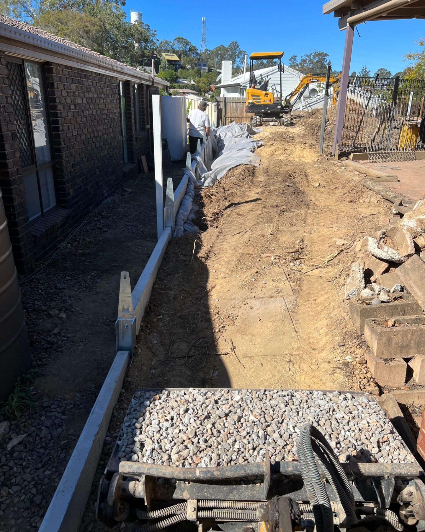 Persistence Pays Off
In the third step of our journey, persistence becomes our ally. We’ve managed to clear a significant portion of the area. This achievement paves the way for the retaining wall’s foundation.