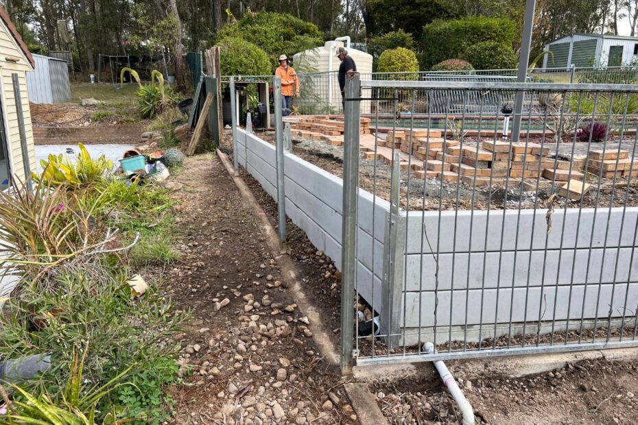 Replacing timber retaining walls with concrete sleeper walls 01